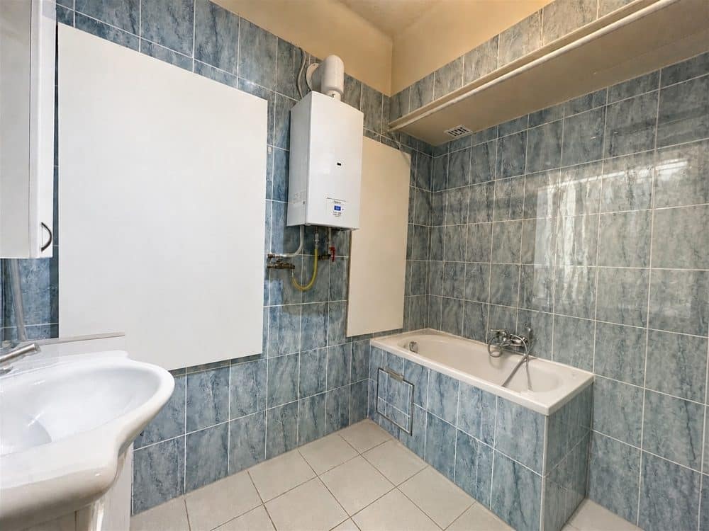 Appartement 3 chambres à vendre à SCHAERBEEK pour 310 000 € (photo 8 sur 12)